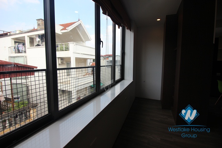 A modern balcony studio for rent on Lac Long Quan, Tay Ho